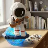 astronaut playing guitar toy, astronaut assembly toy